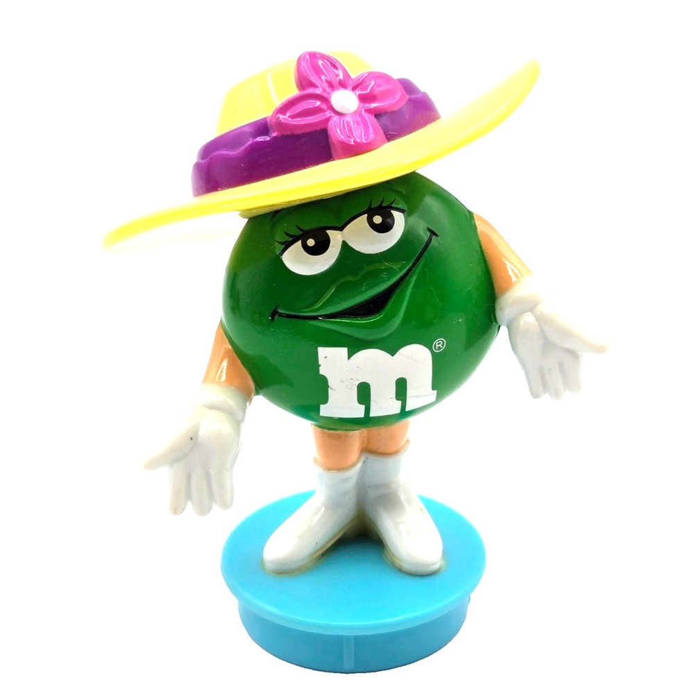 Green M&M Wearing a Yellow Hat Tube‎ Topper